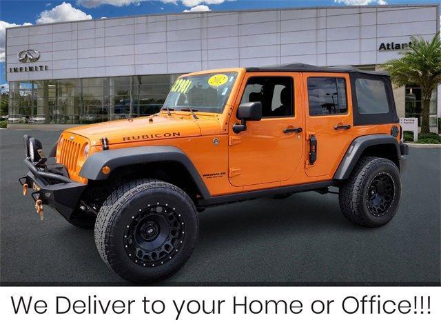 used 2012 Jeep Wrangler Unlimited car, priced at $25,468