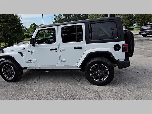 used 2021 Jeep Wrangler Unlimited car, priced at $31,696