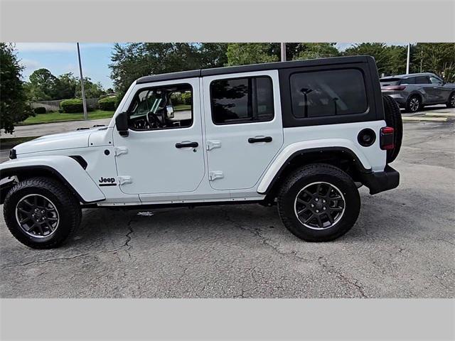 used 2021 Jeep Wrangler Unlimited car, priced at $31,696