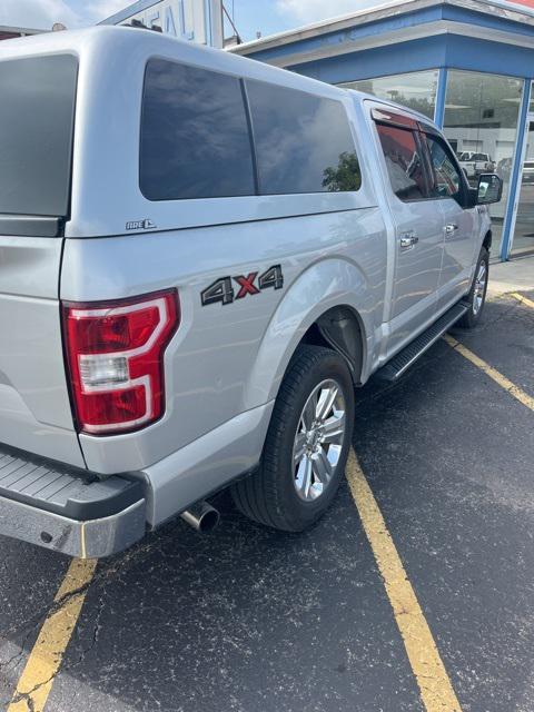 used 2018 Ford F-150 car, priced at $26,273