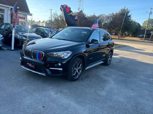 used 2018 BMW X1 car, priced at $13,900