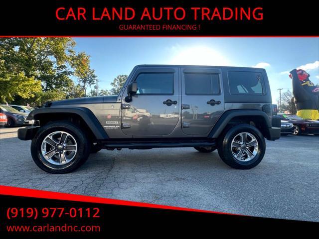 used 2014 Jeep Wrangler Unlimited car, priced at $15,450