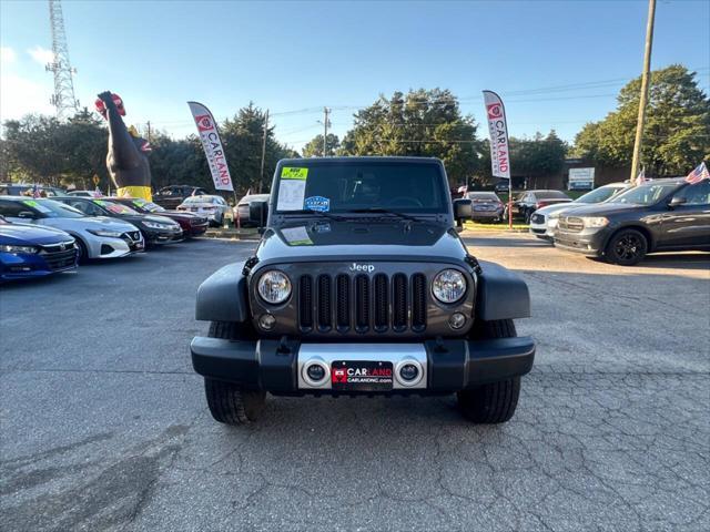 used 2014 Jeep Wrangler Unlimited car, priced at $15,450