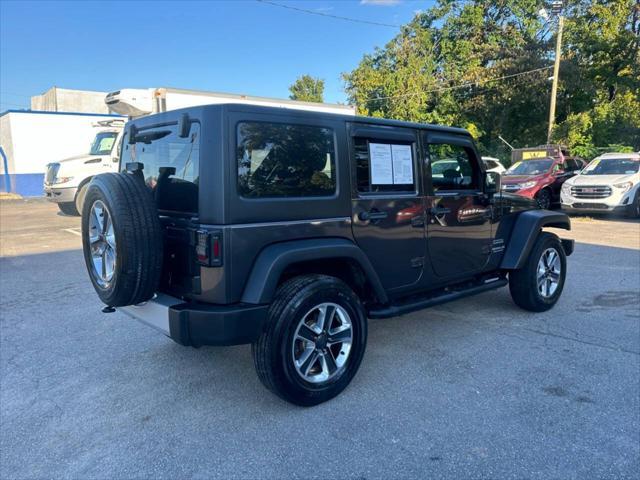 used 2014 Jeep Wrangler Unlimited car, priced at $15,450