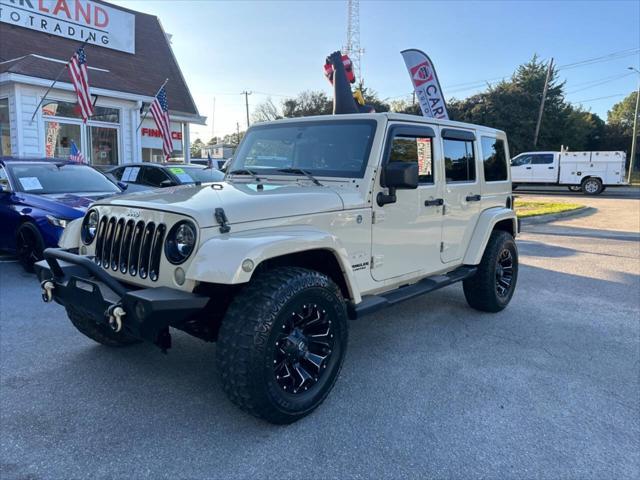 used 2011 Jeep Wrangler Unlimited car, priced at $15,900