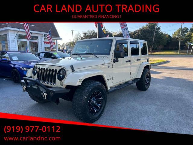 used 2011 Jeep Wrangler Unlimited car, priced at $15,900