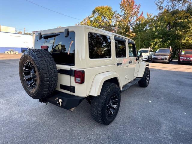 used 2011 Jeep Wrangler Unlimited car, priced at $15,900