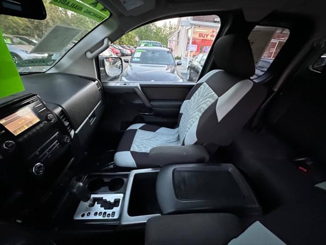 used 2013 Nissan Titan car, priced at $13,900
