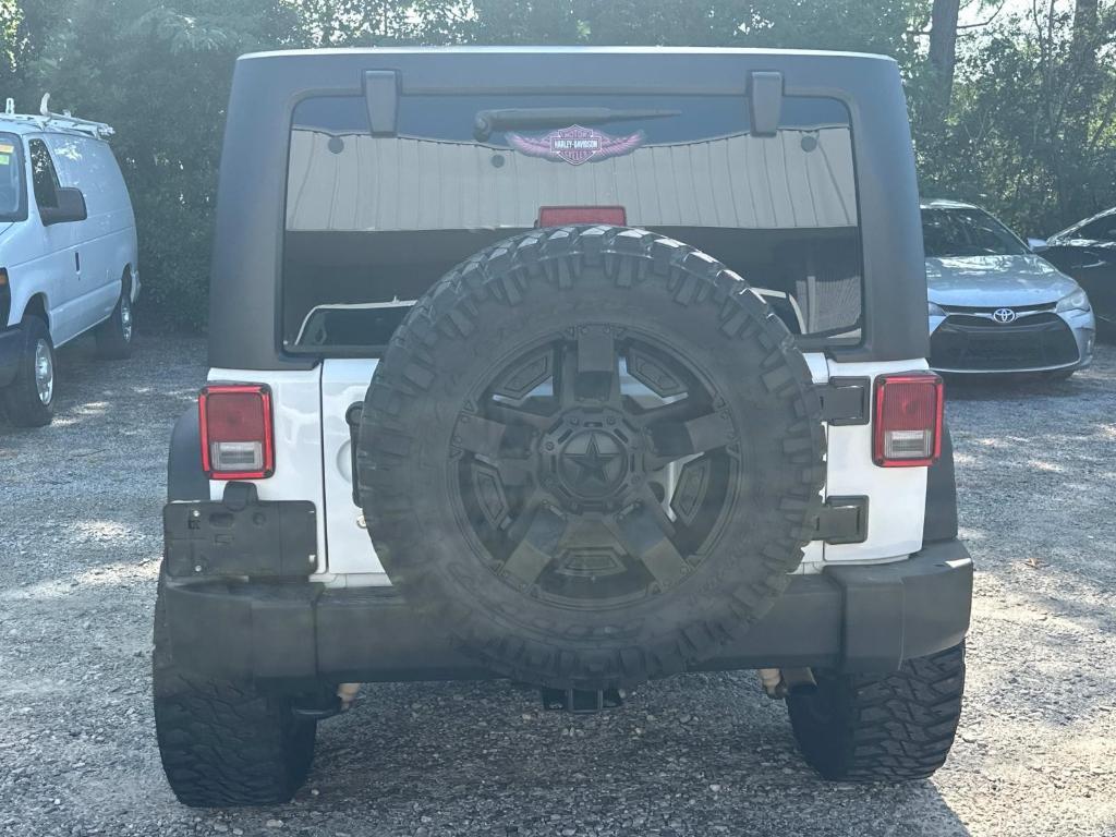 used 2016 Jeep Wrangler Unlimited car, priced at $17,991