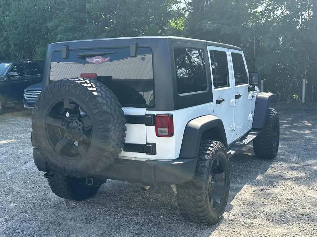 used 2016 Jeep Wrangler Unlimited car, priced at $17,991