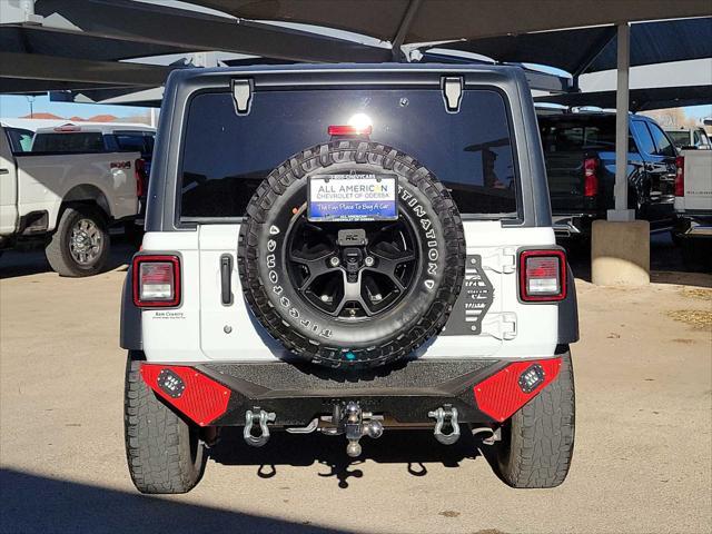 used 2021 Jeep Wrangler Unlimited car, priced at $27,034