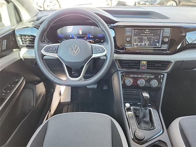 used 2023 Volkswagen Taos car, priced at $23,498