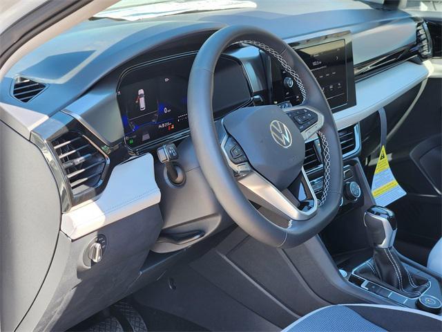 new 2025 Volkswagen Taos car, priced at $26,701
