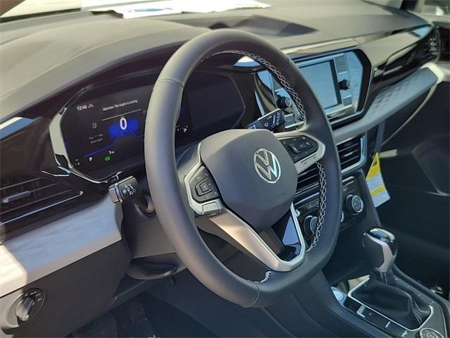 new 2024 Volkswagen Taos car, priced at $28,056
