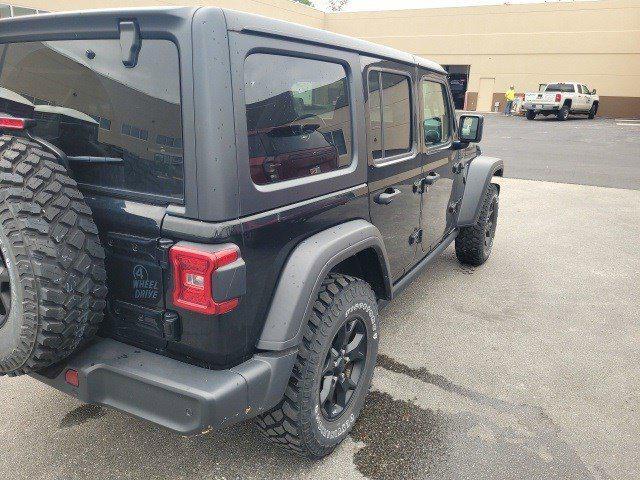 used 2021 Jeep Wrangler car, priced at $34,636