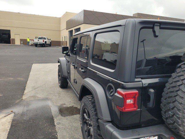 used 2021 Jeep Wrangler car, priced at $34,636