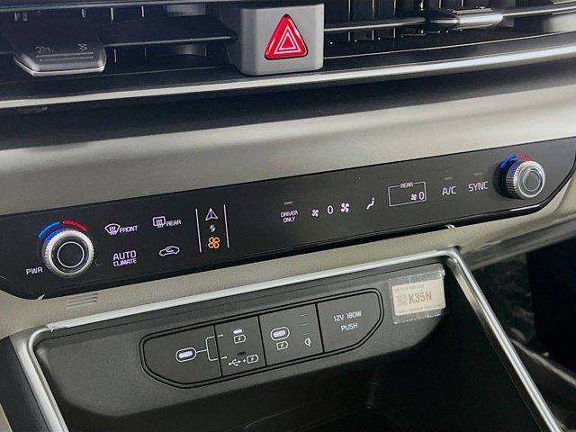 new 2026 Kia Carnival Hybrid car, priced at $49,077