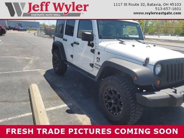 used 2013 Jeep Wrangler Unlimited car, priced at $15,826