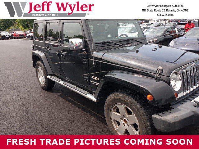 used 2011 Jeep Wrangler Unlimited car, priced at $14,525