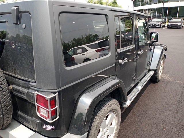 used 2011 Jeep Wrangler Unlimited car, priced at $14,525