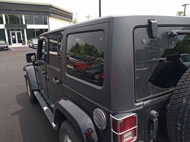used 2011 Jeep Wrangler Unlimited car, priced at $14,525
