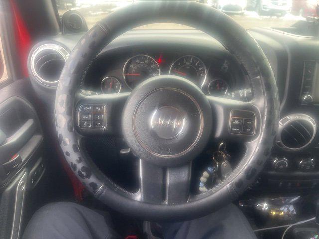 used 2013 Jeep Wrangler Unlimited car, priced at $13,951