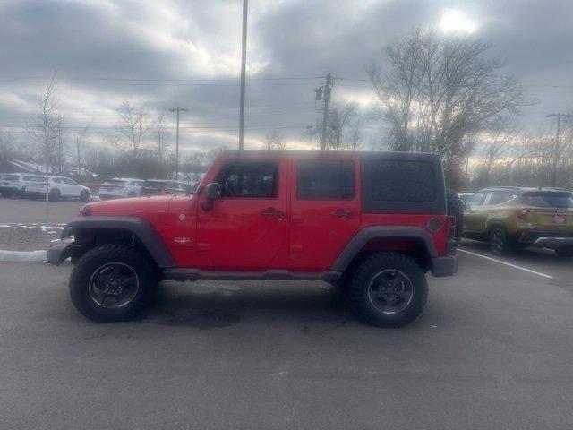 used 2013 Jeep Wrangler Unlimited car, priced at $13,951