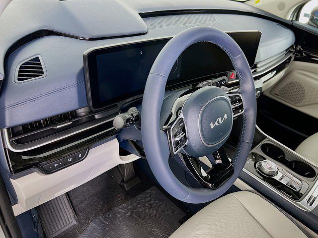 new 2025 Kia Carnival Hybrid car, priced at $53,486