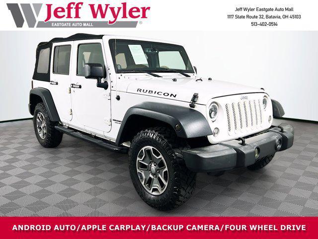 used 2013 Jeep Wrangler Unlimited car, priced at $17,891
