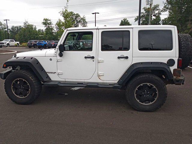 used 2012 Jeep Wrangler Unlimited car, priced at $12,603