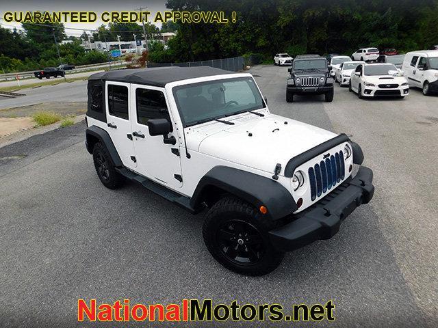 used 2013 Jeep Wrangler Unlimited car, priced at $18,895