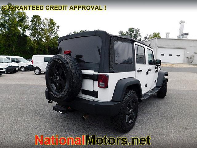 used 2013 Jeep Wrangler Unlimited car, priced at $18,895