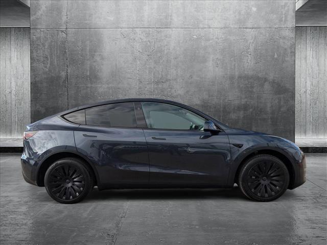 used 2024 Tesla Model Y car, priced at $38,971