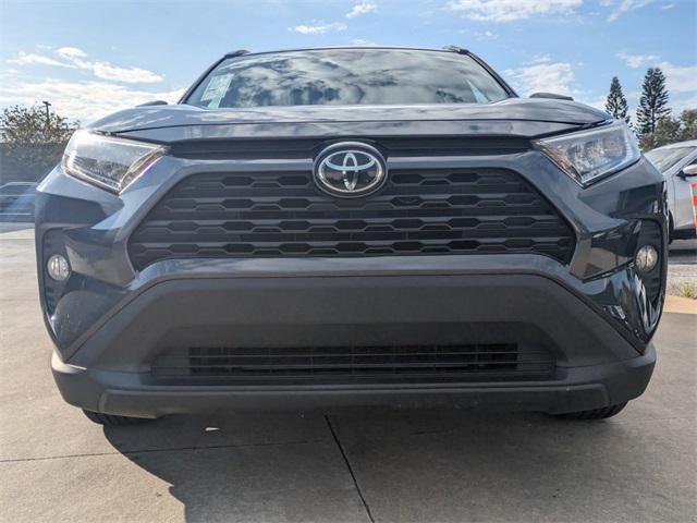 used 2021 Toyota RAV4 car, priced at $20,000