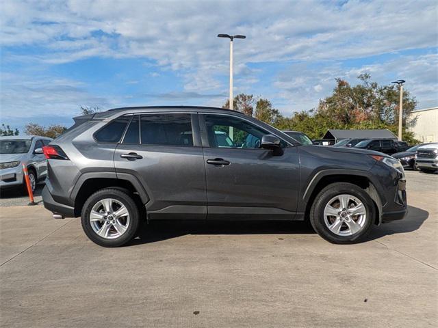 used 2021 Toyota RAV4 car, priced at $20,000