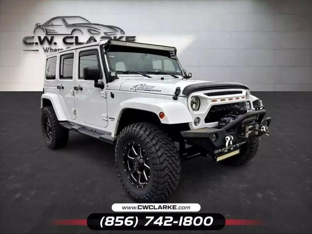 used 2015 Jeep Wrangler Unlimited car, priced at $18,999