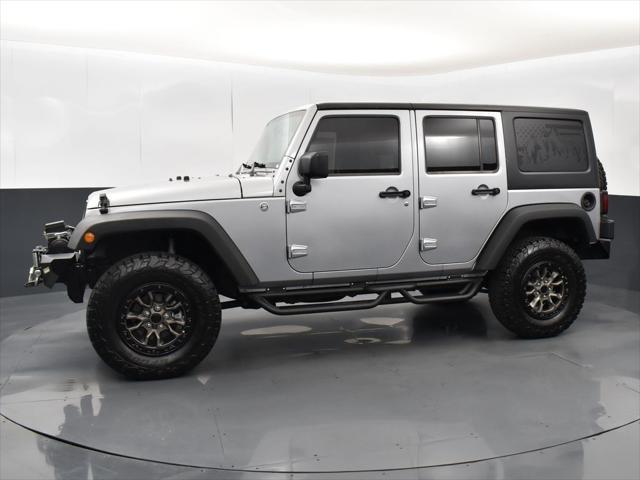 used 2015 Jeep Wrangler Unlimited car, priced at $19,937