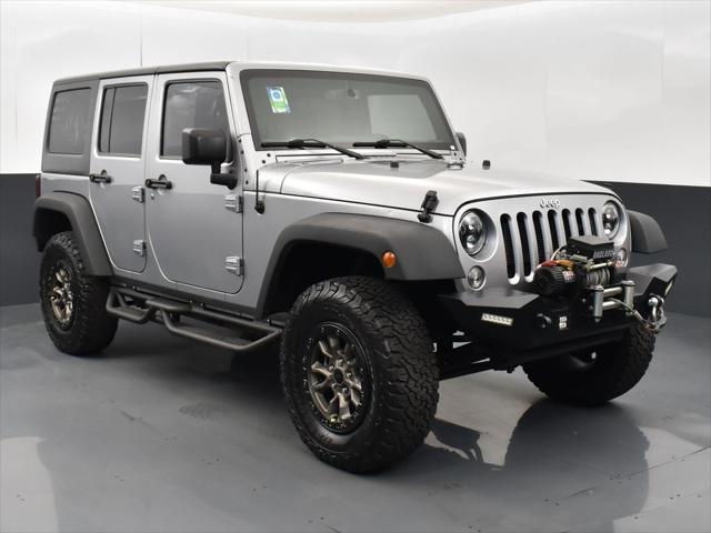 used 2015 Jeep Wrangler Unlimited car, priced at $19,937