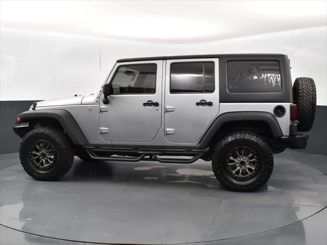 used 2015 Jeep Wrangler Unlimited car, priced at $19,937