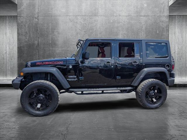 used 2017 Jeep Wrangler Unlimited car, priced at $23,891