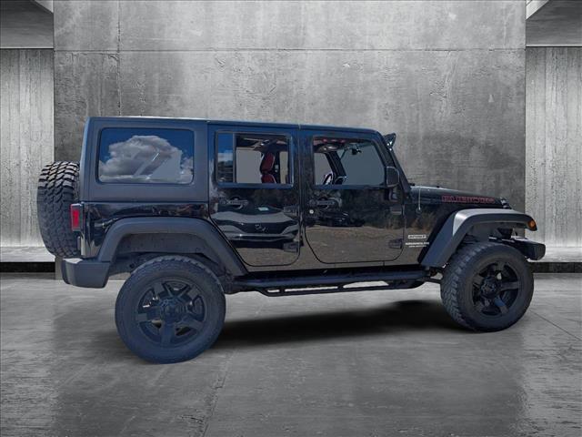 used 2017 Jeep Wrangler Unlimited car, priced at $23,891