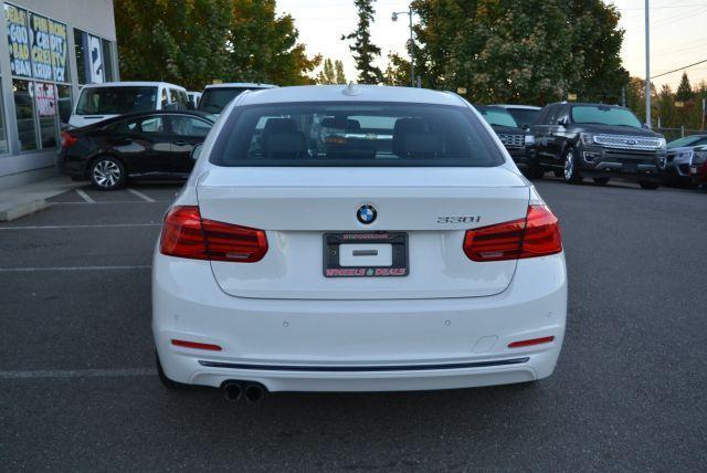 used 2018 BMW 330 car, priced at $14,999