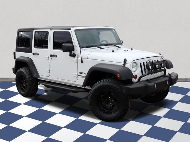 used 2012 Jeep Wrangler Unlimited car, priced at $16,209