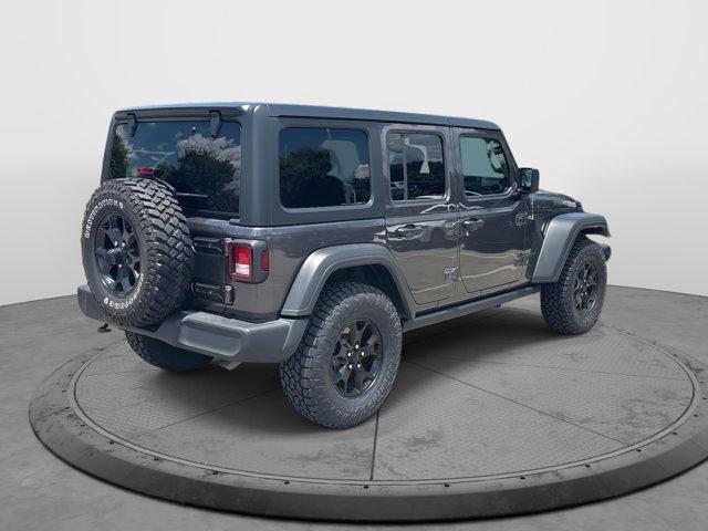 used 2021 Jeep Wrangler Unlimited car, priced at $34,840