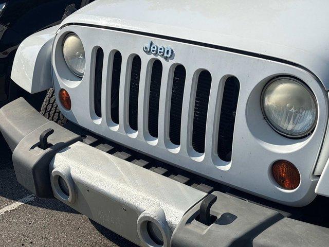 used 2013 Jeep Wrangler Unlimited car, priced at $16,396