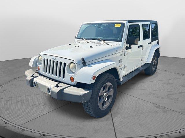 used 2013 Jeep Wrangler Unlimited car, priced at $16,396