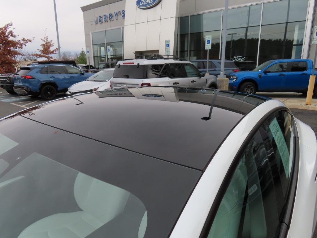 used 2022 Tesla Model 3 car, priced at $25,000