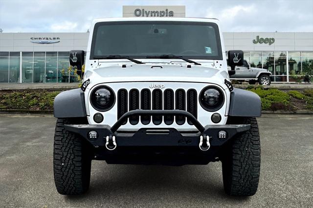 used 2013 Jeep Wrangler Unlimited car, priced at $15,625