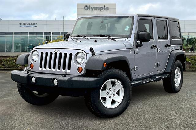 used 2013 Jeep Wrangler Unlimited car, priced at $23,488