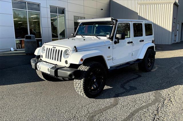 used 2013 Jeep Wrangler Unlimited car, priced at $21,998